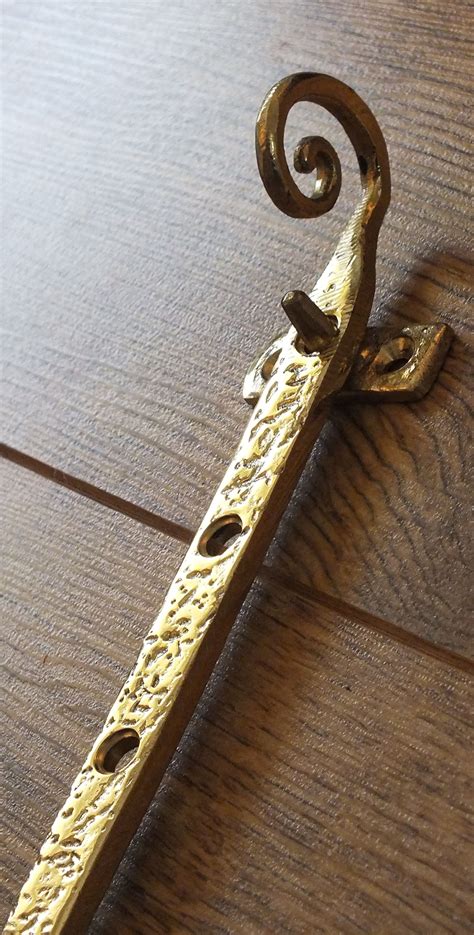 Cast Brass Monkey Tail” Window Furniture From British Ironmongery
