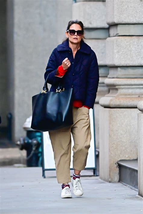 Katie Holmes Looks Casually Chic In Navy Jacket And White Sneakers