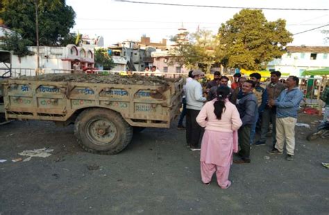 Two Tractor Trolleys Filled With Sand Copra Without Royalty Seized