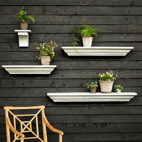 17 Genius Outdoor Wall Decor Ideas to Transform Your Space - Brit + Co