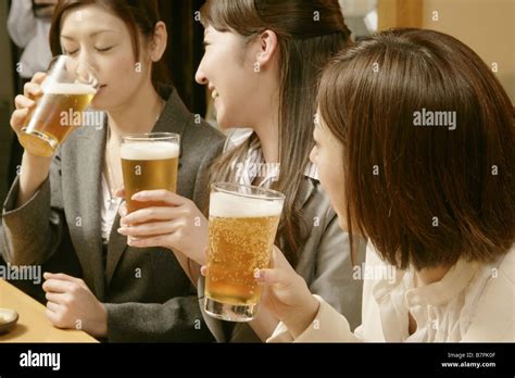 Women Drinking Beer In The Japanese Style Pub Stock Photo Alamy