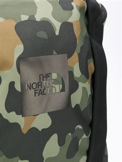 The North Face Camouflage Print Backpack, $89 | farfetch.com | Lookastic