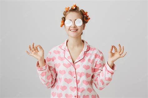 Free Photo Cute Happy Girl In Nightwear And Hair Curlers Wipe Off