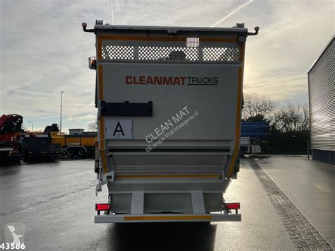 Camion benne à ordures ménagères DAF FA N XD 340 Hiab 23 Tonmeter