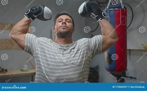 Athlete In Boxing Gloves Shows Muscles On His Hands Stock Image Image