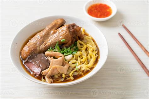 Egg Noodles With Stewed And Braised Duck In Brown Soup Stock