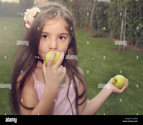 Child Eating Apple Stock Photo Alamy