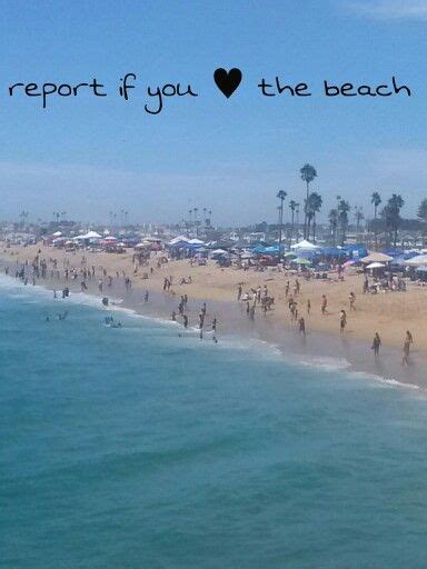 The Beach Is Crowded With People And Umbrellas