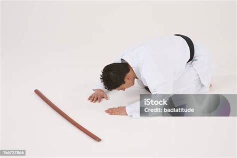 Bowing Male In Karate Suit Stock Photo Download Image Now Authority