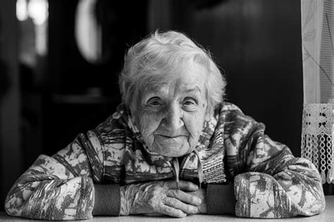 Black And White Portrait Of An Elderly Woman Stock Photo Download