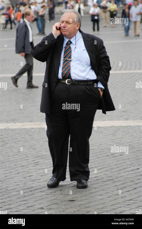 Fat Man On Mobile Phone Stock Photo Alamy