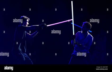 Laser swords fighting show, during a sports summer camp, in Milan Stock ...