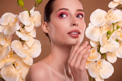 Photo Of Dreamy Seductive Woman Naked Shoulders Enjoying Orchid Extract