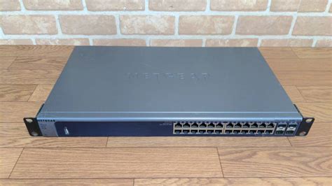 【やや傷や汚れあり】＜318y100＞netgear【ネットギア】gsm7224 V2h1 24ポートギガビットマネージスイッチ 動作未確認品