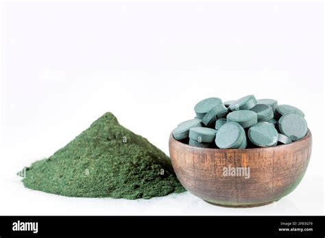 Spirulina Algae Powder And Tablets Arthrospira Platensis Stock Photo