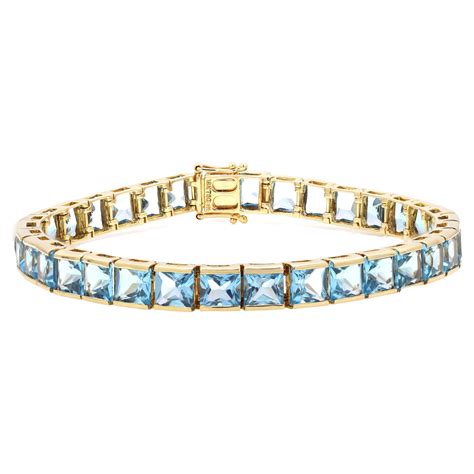 Solid 18K Yellow Gold 13 65 Carat Blue Topaz Tennis Bracelet For Women