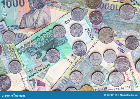 Money from Indonesia, Rupiah Banknotes and Coins. Stock Photo - Image ...