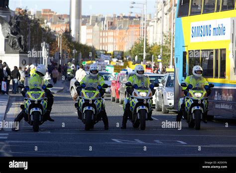 Four Garda Siochana Irish Police Force Traffic Police Cops On