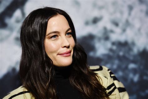 Liv Tyler Goes Wild in Tiger Print Coat for Stella McCartney x Adidas ...