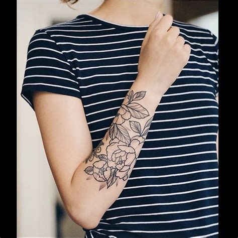 Outline Black Floral Tattoo Inked On The Right Forearm Ink Tattoo