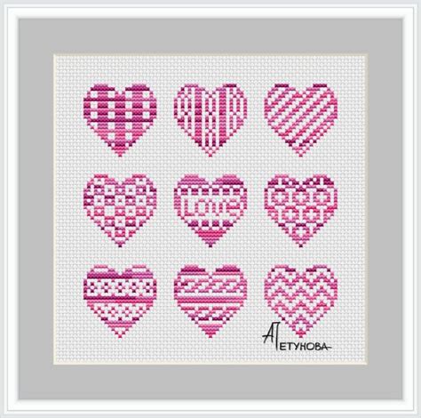 A Cross Stitch Pattern With Nine Hearts In Pink And White On A Gray