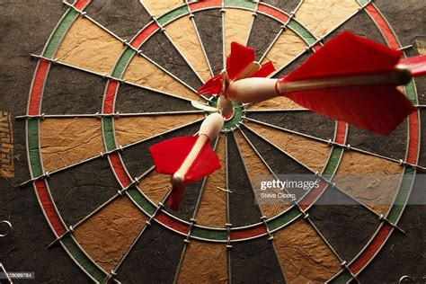 Bullseye With Darts High-Res Stock Photo - Getty Images