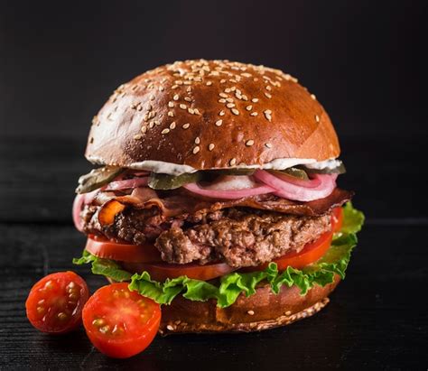 Premium Photo Beef Burger With Lettuce And Cherry Tomatoes