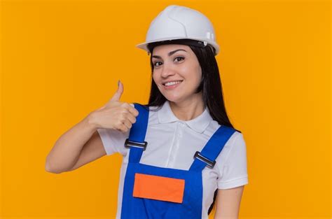 Mulher Jovem Construtora Feliz Em Uniforme De Constru O E Capacete De