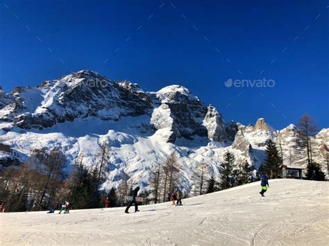 Skiing in Dolomites Stock Photo by ivanat94 | PhotoDune