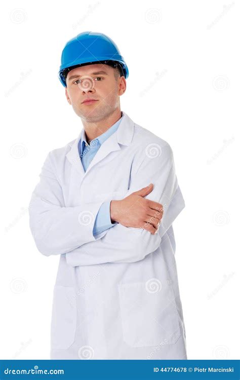 Man In A Lab Coat And Helmet Stock Photo Image 44774678