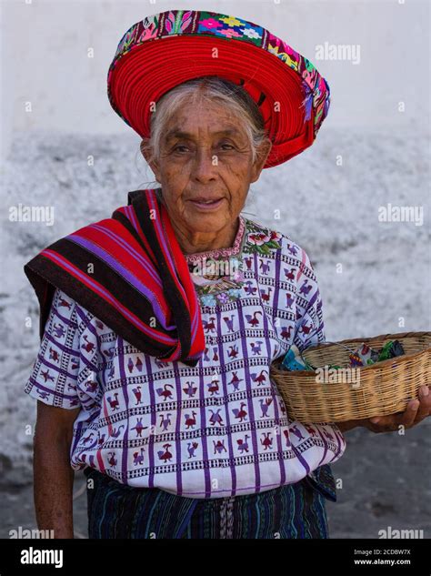 An Older Tzutujil Mayan Woman In Traditional Dress Including The