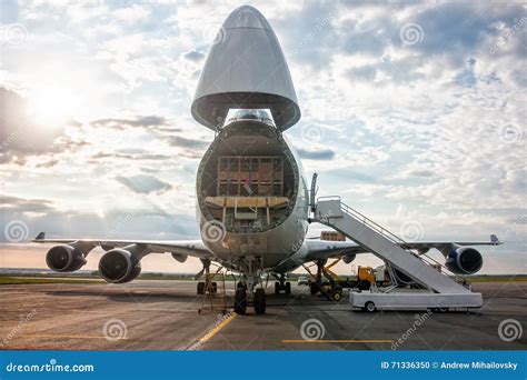 Unloading Wide-body Cargo Aircraft Royalty-Free Stock Photo ...