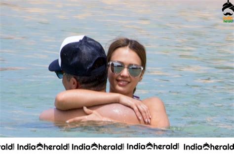 Jessica Alba Wears Purple Bikini While Vacationing In Hawai