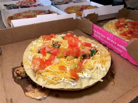 Taco Cabana Vs Taco Bell Battle Of The Taco Pizzas Heats Up