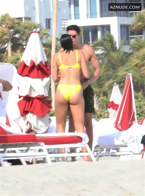 Dua Lipa Sexy In Yellow Bikini As She Takes Dip In The Ocean With Her SisterRina In Miami AZNude