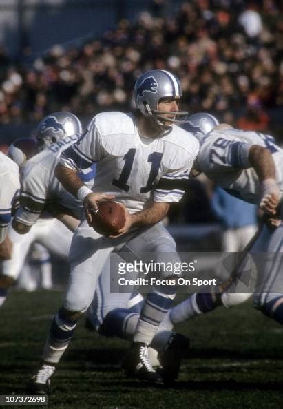 Quarterback Greg Landry Of The Detroit Lions Turns To Hand The Ball