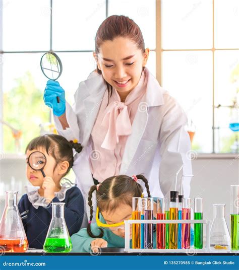 Science Teacher Teach Students In Laboratory Room Stock Image Image