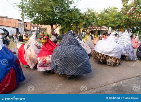 Cultural Group Caretas De Acupe Performs In Costume Through The Streets