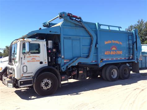 Orlando Dumpster Rental Company Adds Two New Trucks to Transport Roll-Off Dumpsters