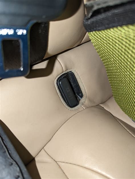 Seat belt buckle access | Tesla Motors Club