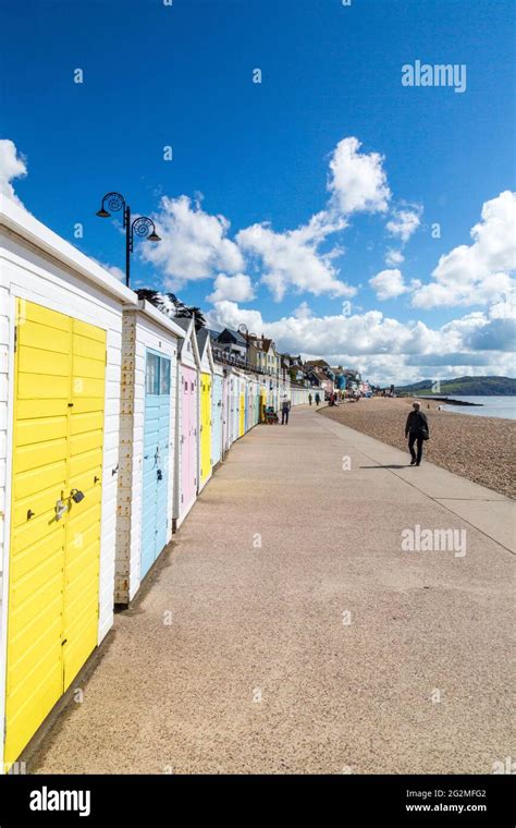 Colourful Pastel Coloured Beach Huts On The Sea Front In Lyme Regis On