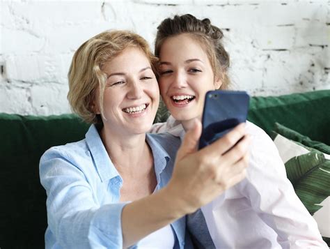 Premium Photo Portrait Of Beautiful Mature Mother And Her Daughter