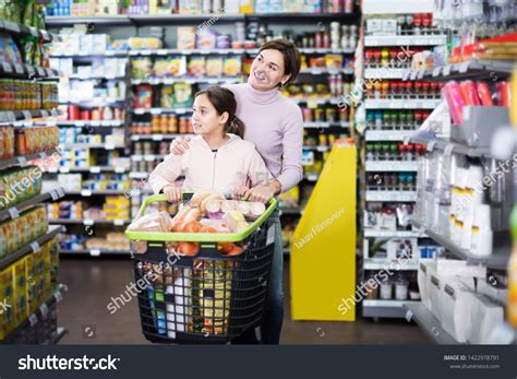 Cheerful Female Customer Teenage Daughter Restocking Stock Photo ... 