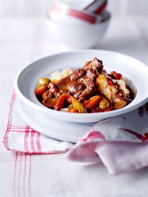 Spanish Style Pork With Olives And Peppers Recipe Delicious Magazine