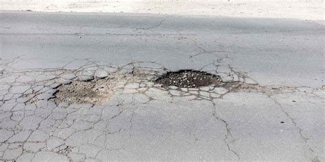 How To Properly Fill A Sinkhole In Your Driveway