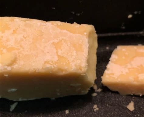 Aged Cheddar With A Crusty White Smear