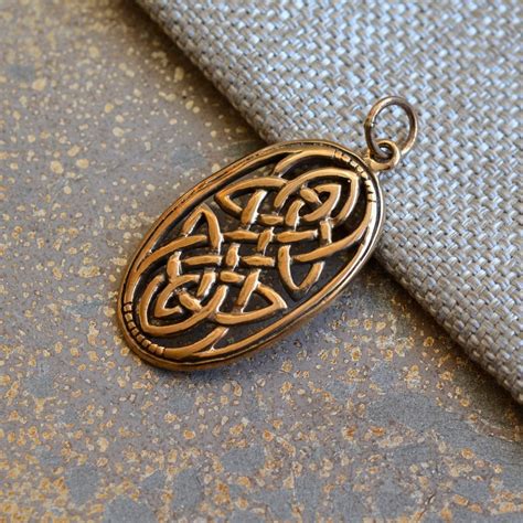 Celtic Knot Pendant In Bronze Large Oval Celtic Knot