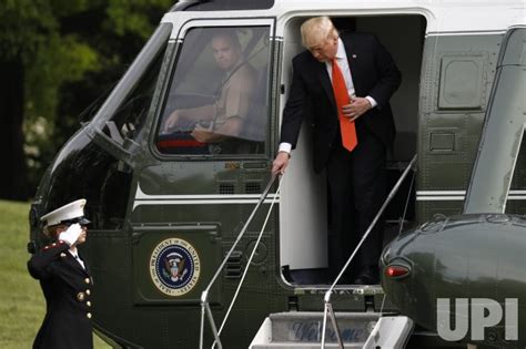 Photo President Donald Trump Returns To The White House