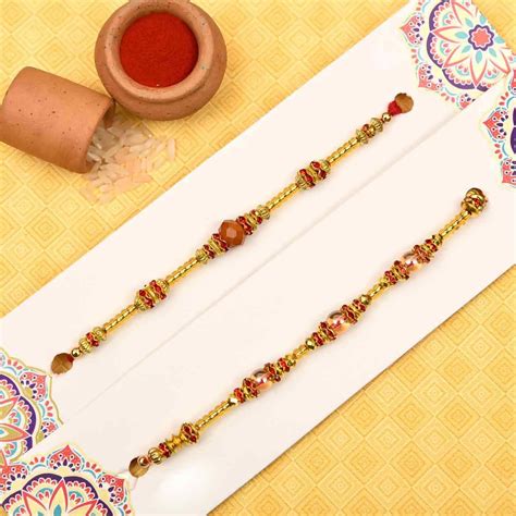 Unique Golden Red Bead Rakhi Set Of