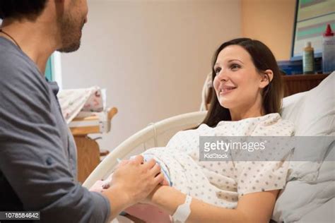 Pregnant Man Giving Birth To A Baby In Hospital